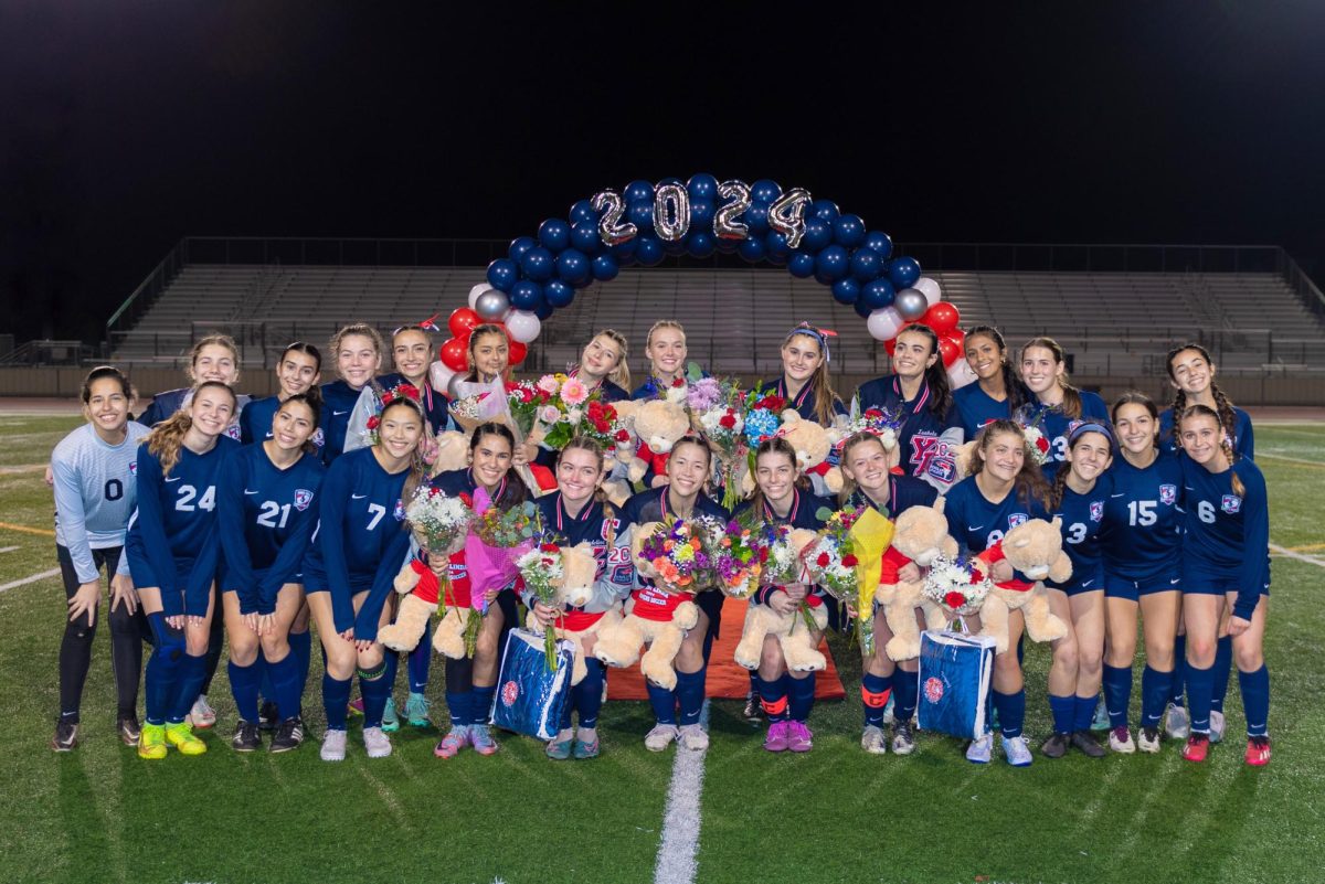 The Varsity Womens soccer team on Senior Night. 