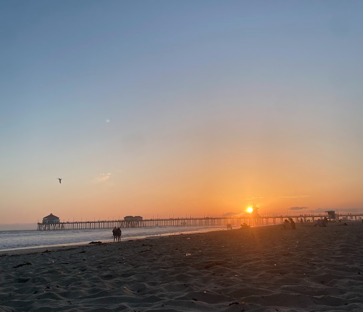 Relaxing after the AP exams by watching the sunset at Huntington Beach.