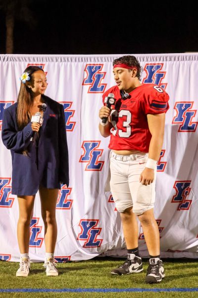 Chloe Chang (12) interviewed Robert Oropeza (12) following their win against Edison.