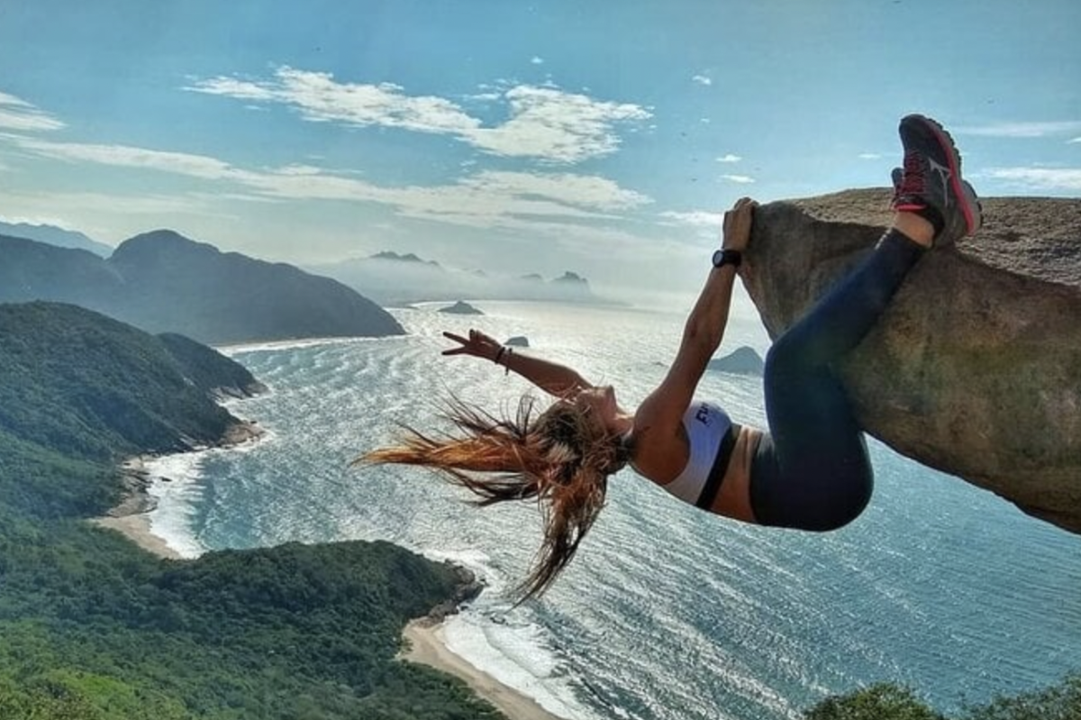 Here, this woman is seen risking her life and putting her life on the hands of, well, her hands. 