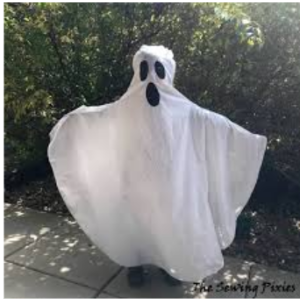 Easy DIY Ghost costume using a white sheet. 
