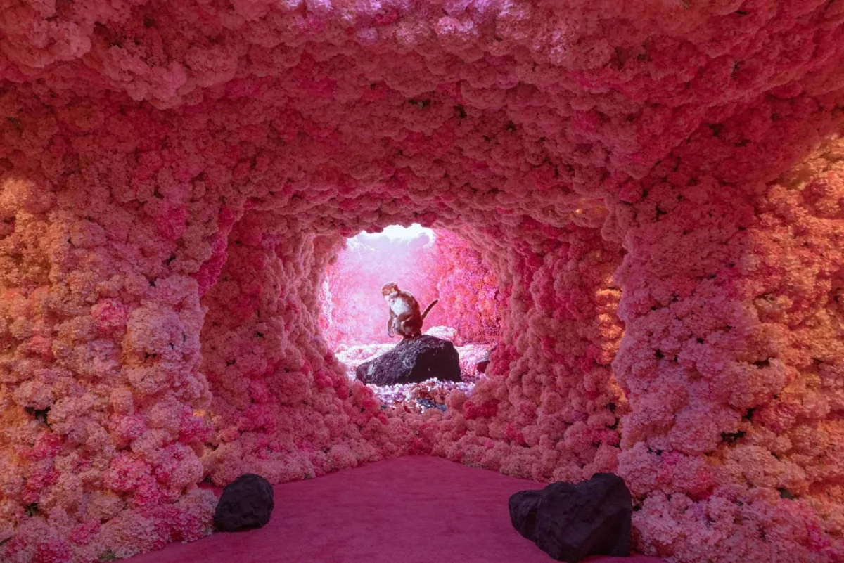 The Cave exhibit inside Mercer Labs is covered in pink hydrangea flowers.
