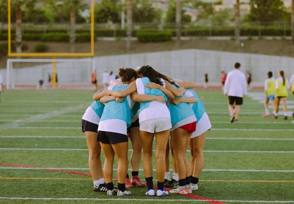 The YLHS Women’s Soccer team huddles up after a practice well spent.