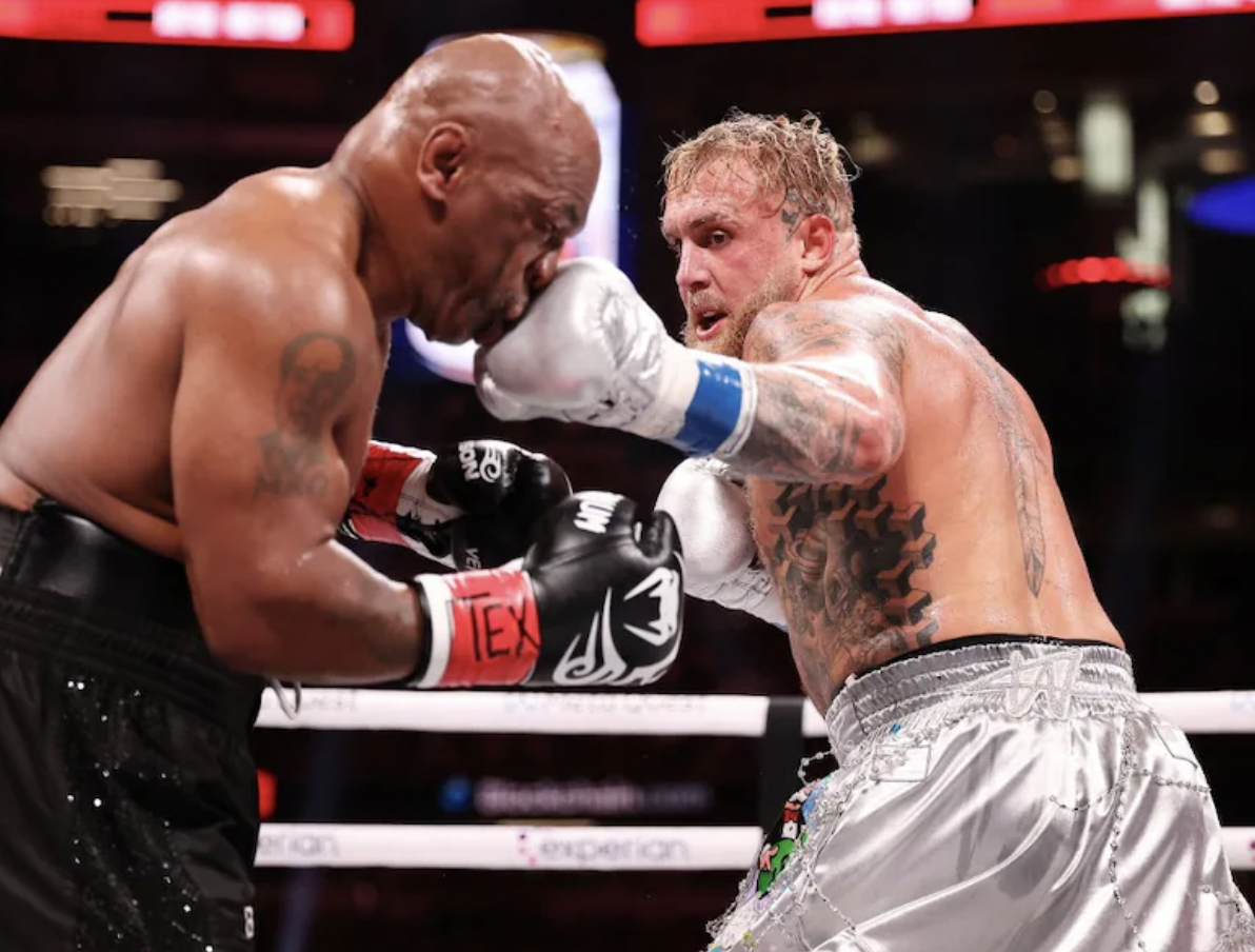 Jake Paul (27) taking a hit at Mike Tyson (58) at the extremely talked-up fight between the two on November 15, 2024.
