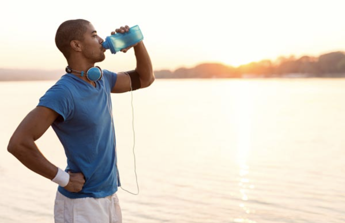 This photo portrays a healthy man exercising and staying healthy.
