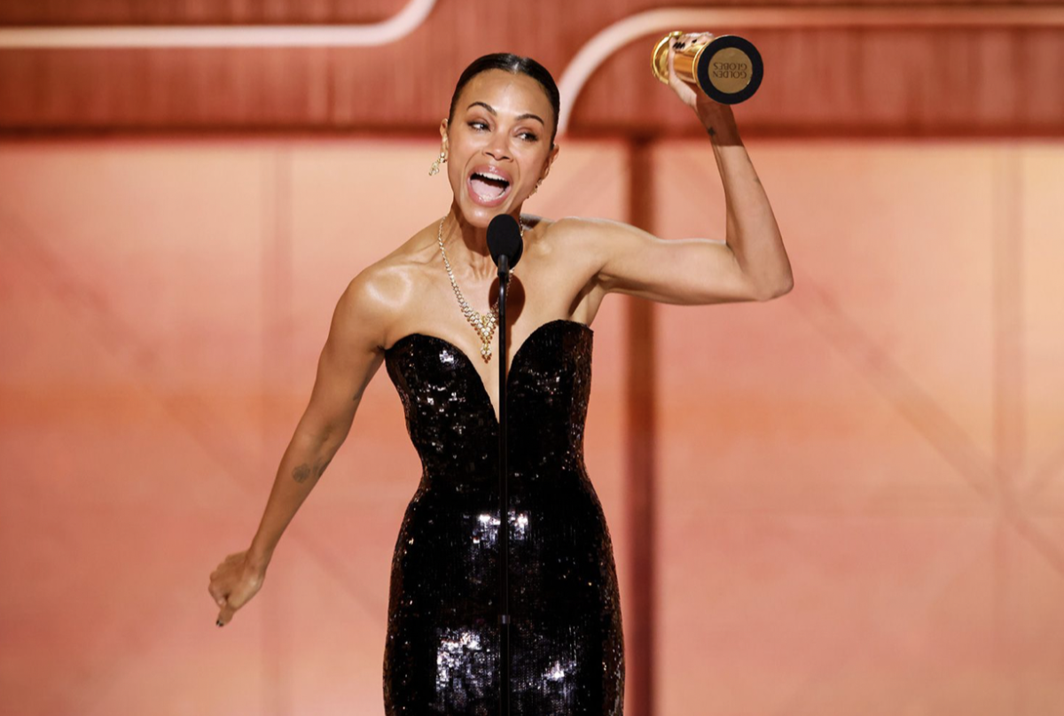 Zoe Saldana basks in victory, holding her Golden Globe high as she delivers a powerful acceptance speech at the 2025 Golden Globes.
