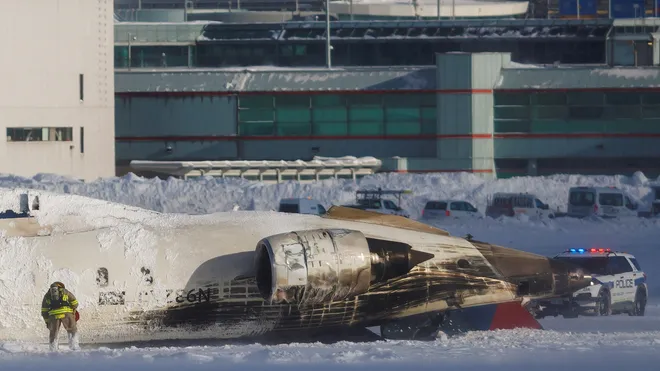 A Delta flight flips upside down while making an emergency landing at the Toronto airport.