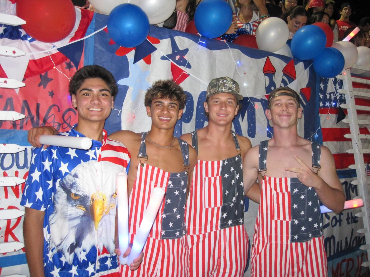 Josh Willerer (12) and his friends emulating school spirit, decked out in stripes and stars at YL’s USA themed football game