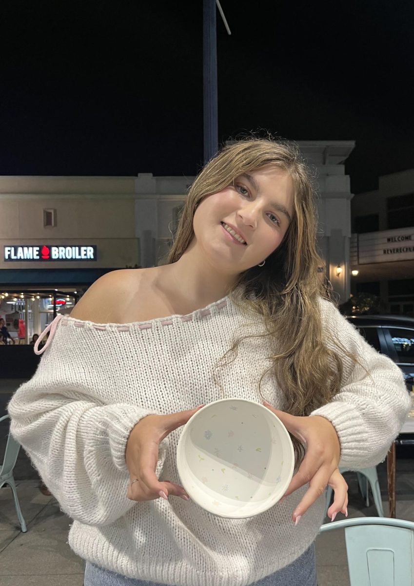Talia Chavez (10) shows off her painted bowl, proving heart disease can’t slow her down.
