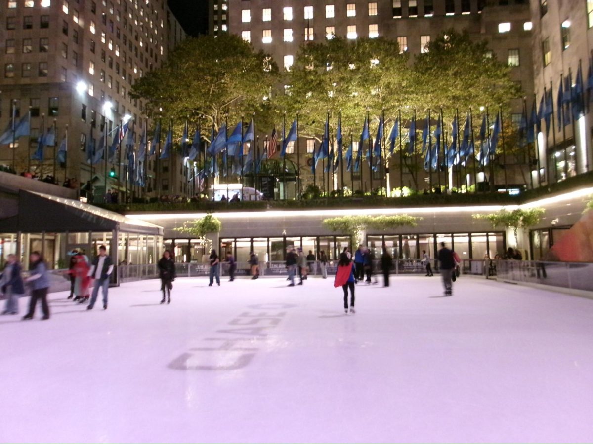 The Rockefeller Center rink sees a festive crowd on Halloween evening.