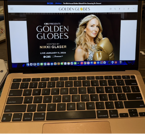 Nikki Glaser poses for the poster, a promotion urging viewers to tune in for the Golden Globes.  
