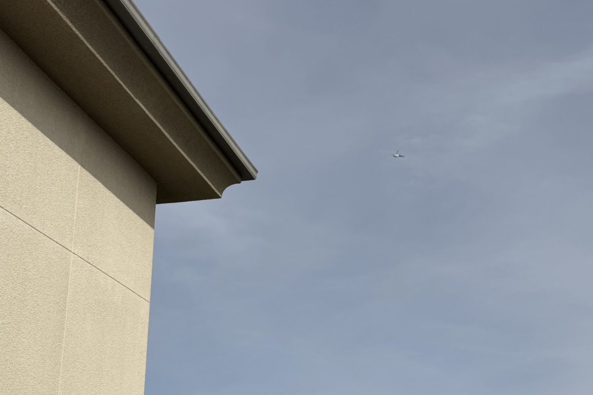 Orange County Sheriff Helicopter flying above Yorba Linda High School.