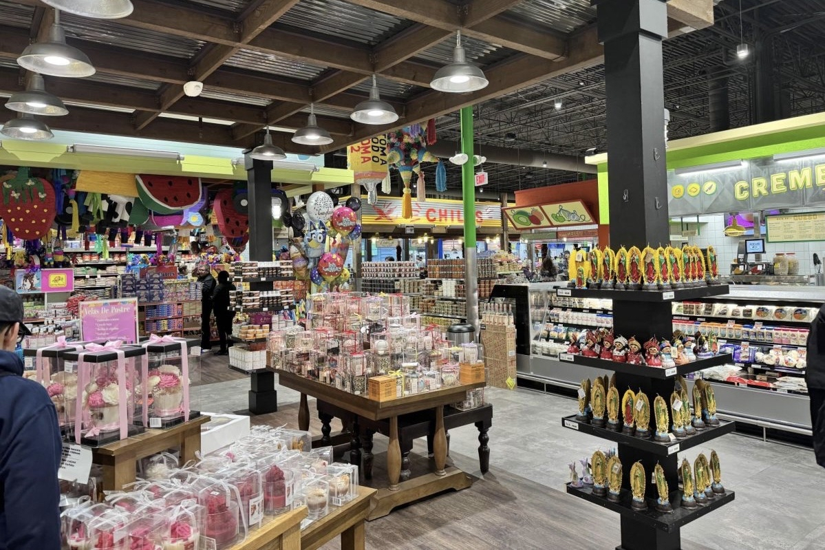 A variety of groceries and food stands line the inside of Northgate Market.