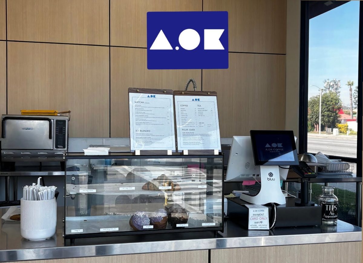 The register of A.OK Coffee in La Habra, along with its signature logo attached above.