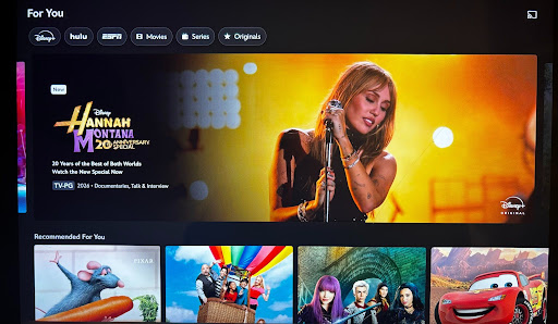  A photo of the Hannah Montana 20th Anniversary Special Poster on the home menu screen of Disney+.