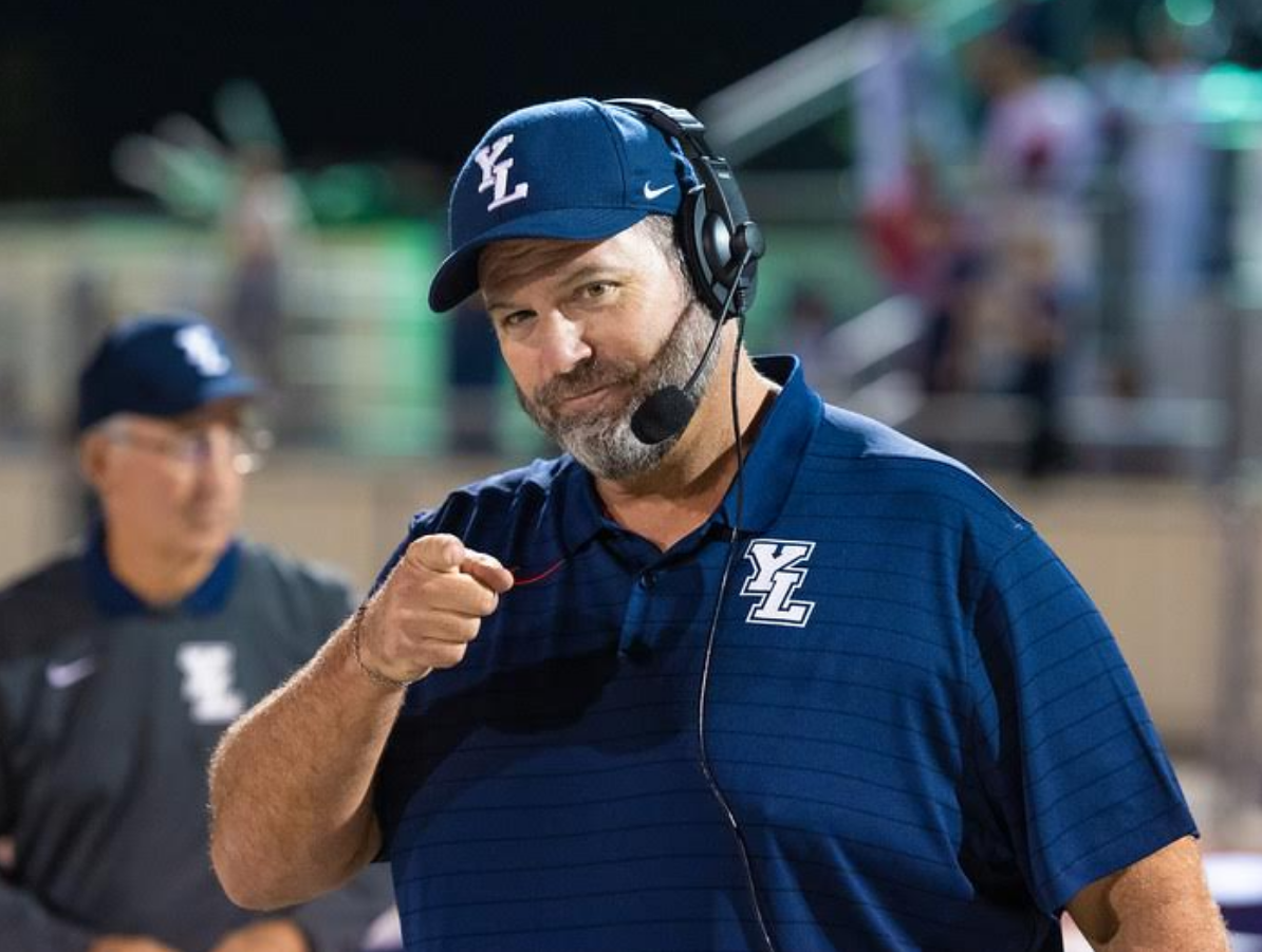Coach Bailey on the football field
