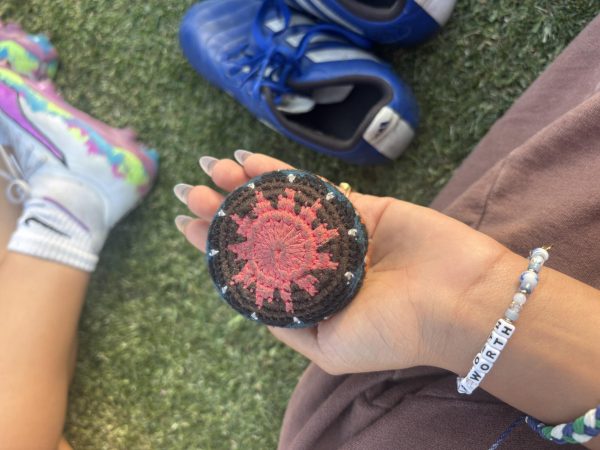 A type of hacky sack used for kicking around with friends in a circle. 