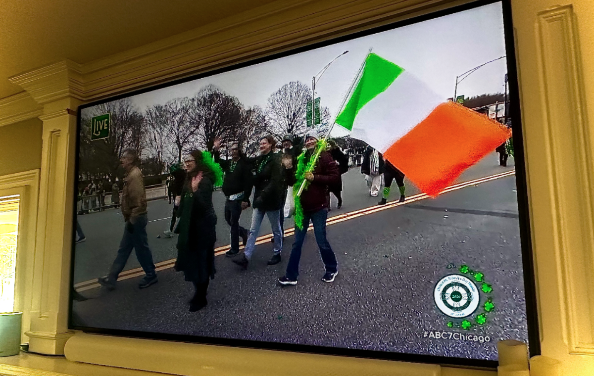 Folks celebrate Irish culture as they walk in the Chicago St. Patrick’s Day Parade.